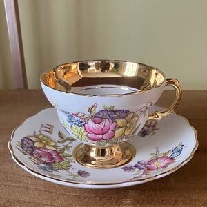 Vintage floral & gold bone china teacup and saucer Rosina England